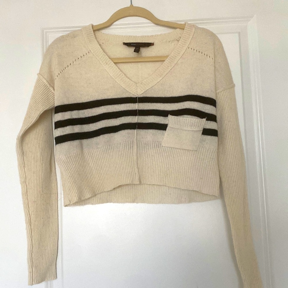 Bcbg crop sweater, off white color with black stripes. Good condition